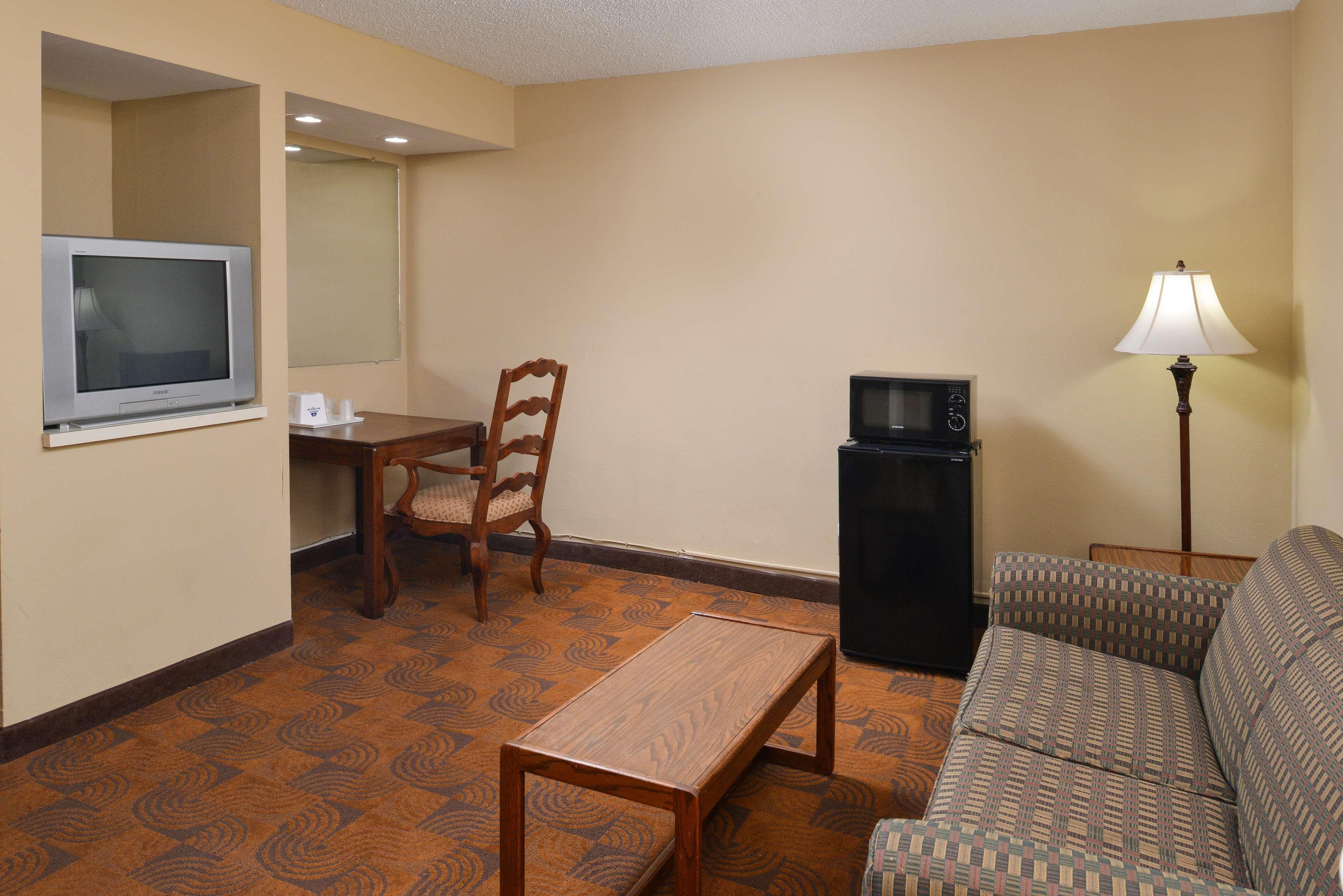 Pullman Sao Paulo Ibirapuera Hotel Exterior photo Living room of a typical extended stay hotel room
